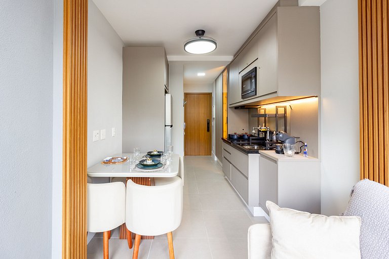 Apto moderno com garagem e sofá-cama