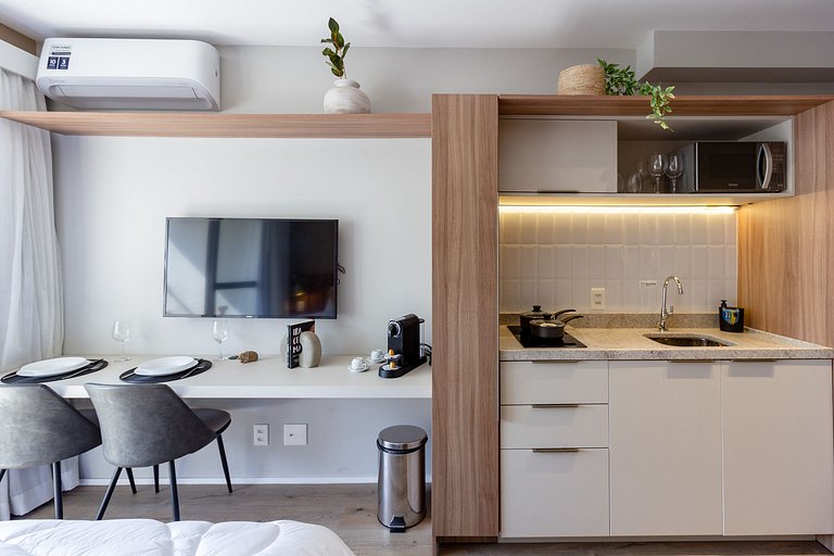Studio charmoso com decoração moderna